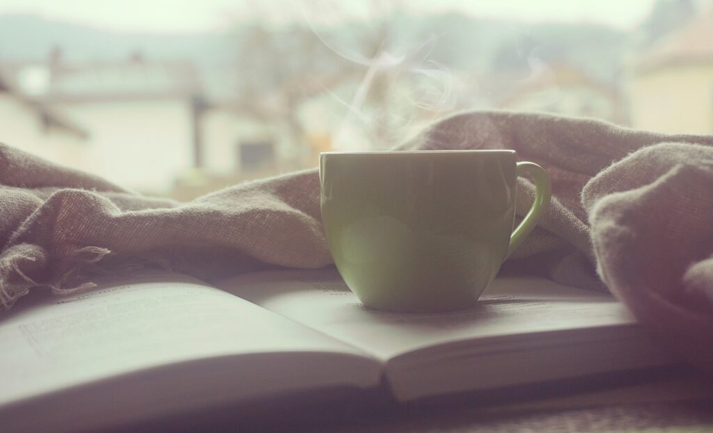 A cup of coffee on a book