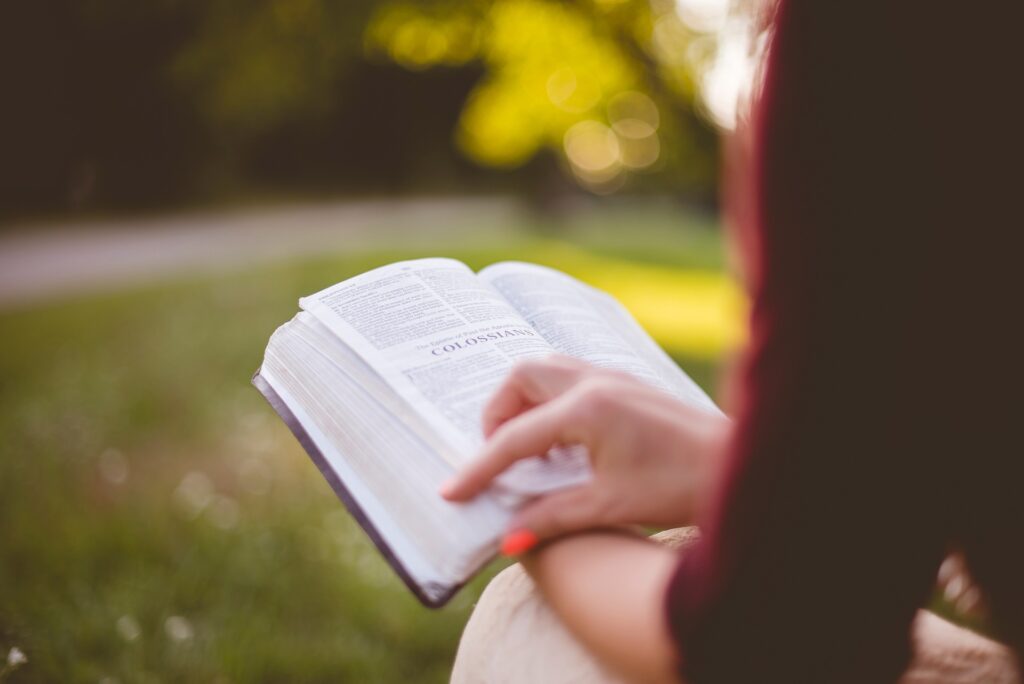 A woman is reading The Bible